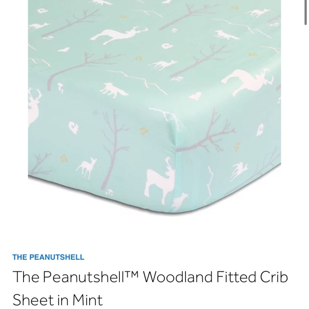 The Peanutshell Woodland Fitted Crib Sheet in Mint